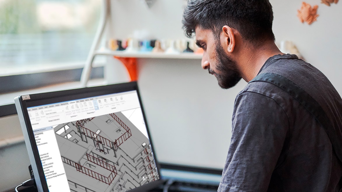 Person working on a desktop computer