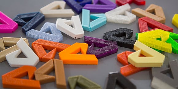 Multi-colored Autodesk logo cutouts